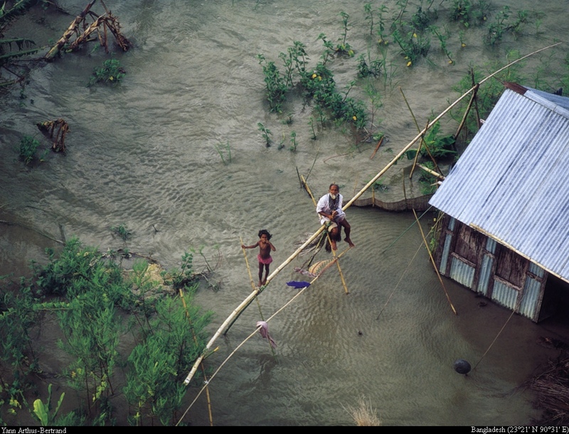 [B14 SLR: Yann Arthus-Bertrand] Flooded dwellings south of Dhaka; DISPLAY FULL IMAGE.
